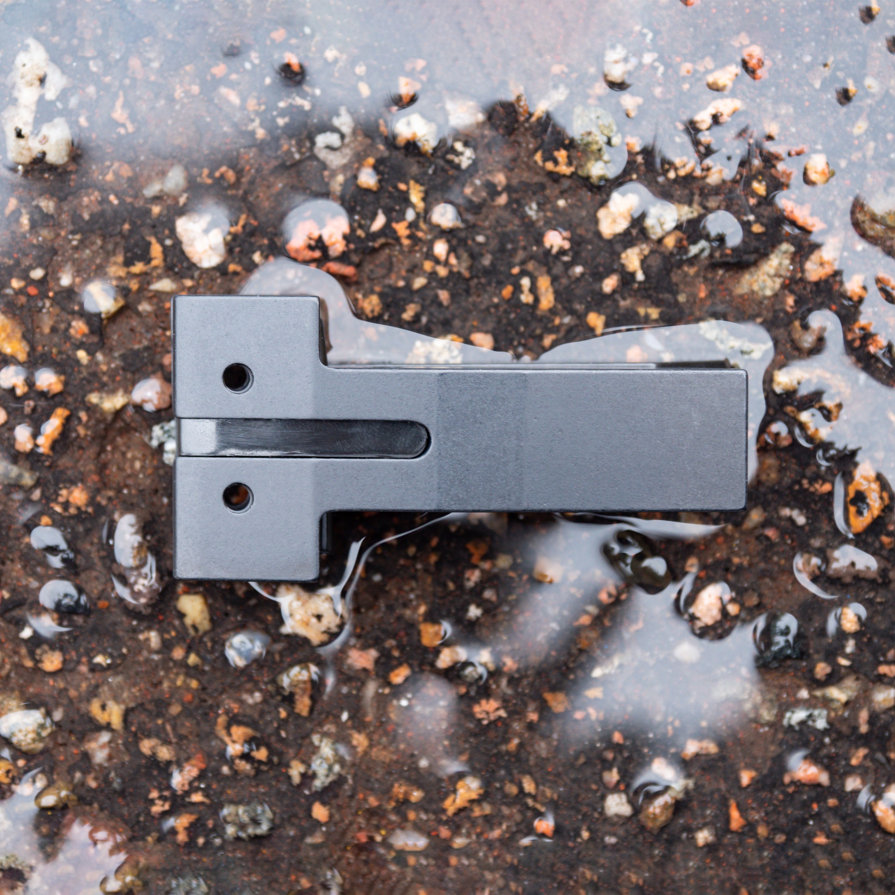Gen 3 V2 Jaws for 3/16" Blades in close-up on gravel background from top-down angle.