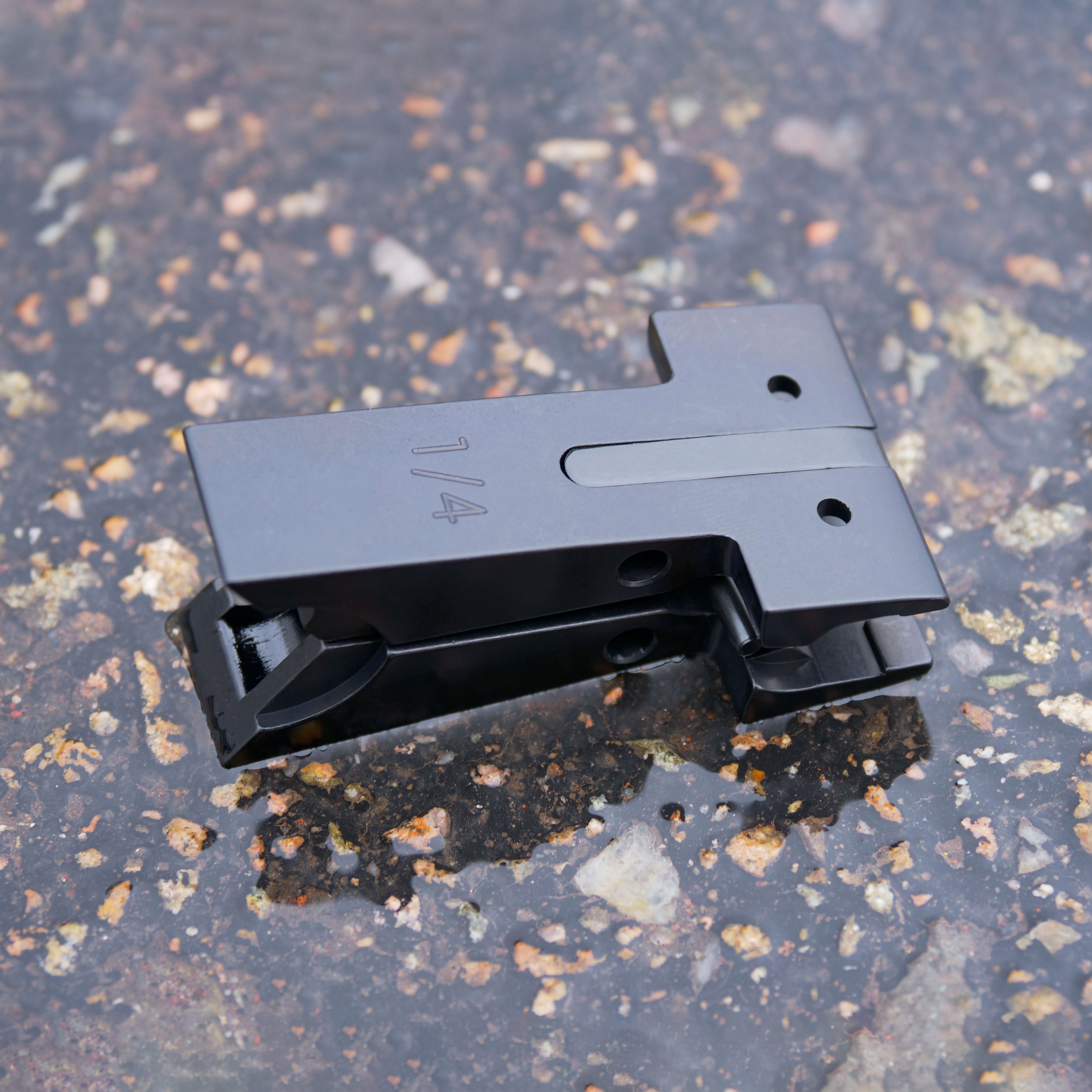 DualCam© Vise Jaws for 1/4" Blades close-up on textured surface from front angle.