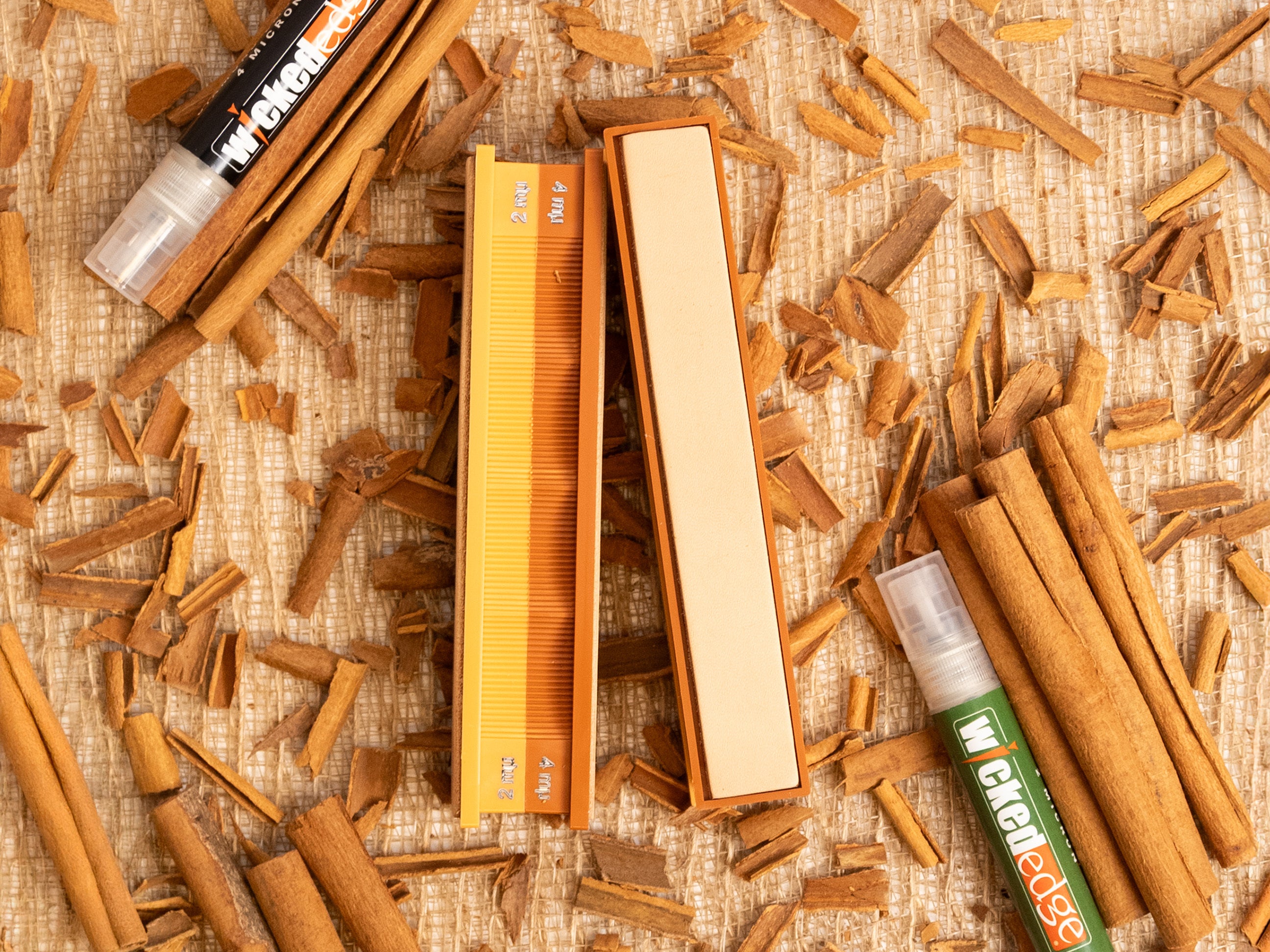 WE0402PDE Emulsion Strop Pack with cinnamon sticks and shavings. Top view.