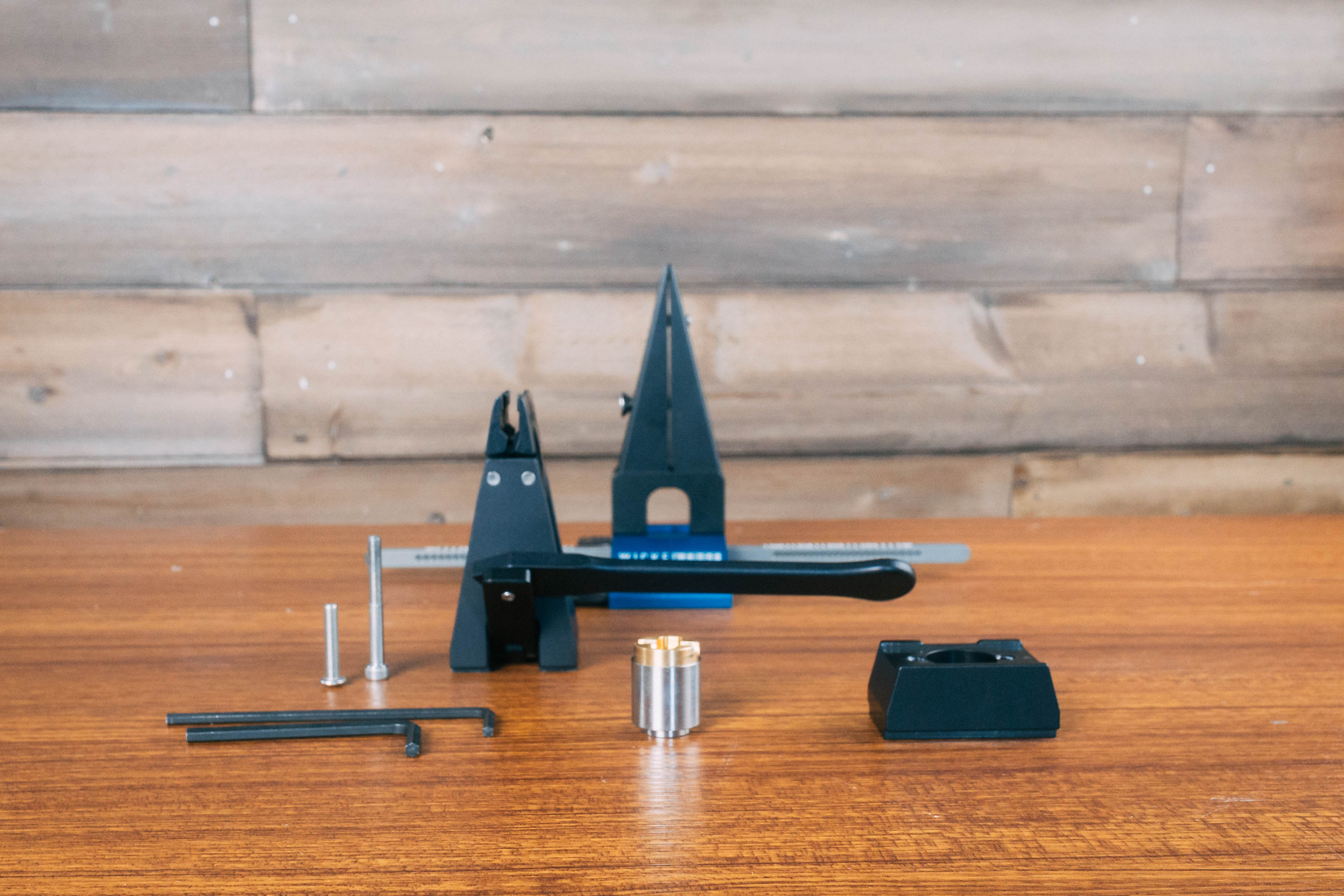 WE120 displayed with parts for DualCam vise upgrade. Front view.