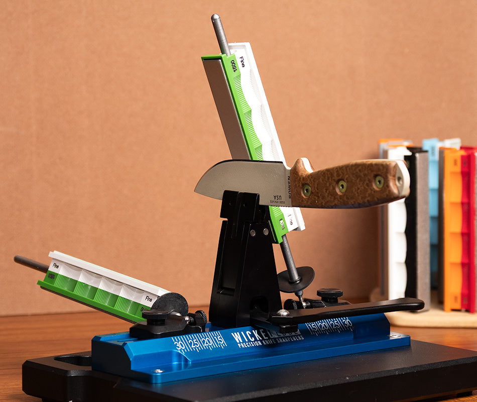 Premium 1500 Grit Diamond Stones and Blank Glass Platens Pack mounted in Wicked Edge sharpener at close-up view from front angle.