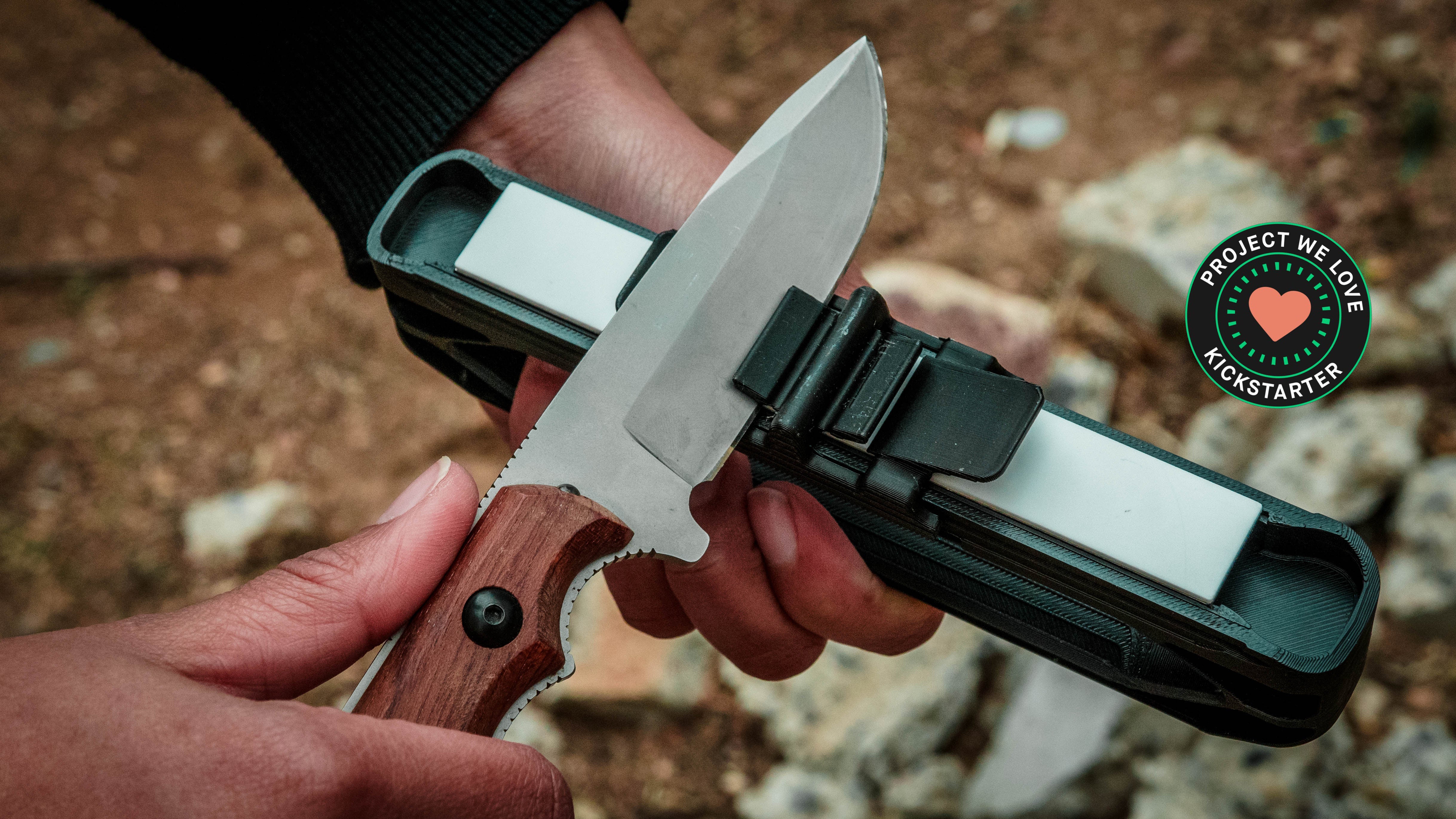 A field knife being sharpened on the Venture knife sharpener