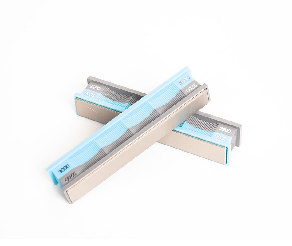 Premium 2200 / 3000 grit diamond sharpening stones in close-up studio setting from straight-on angle.