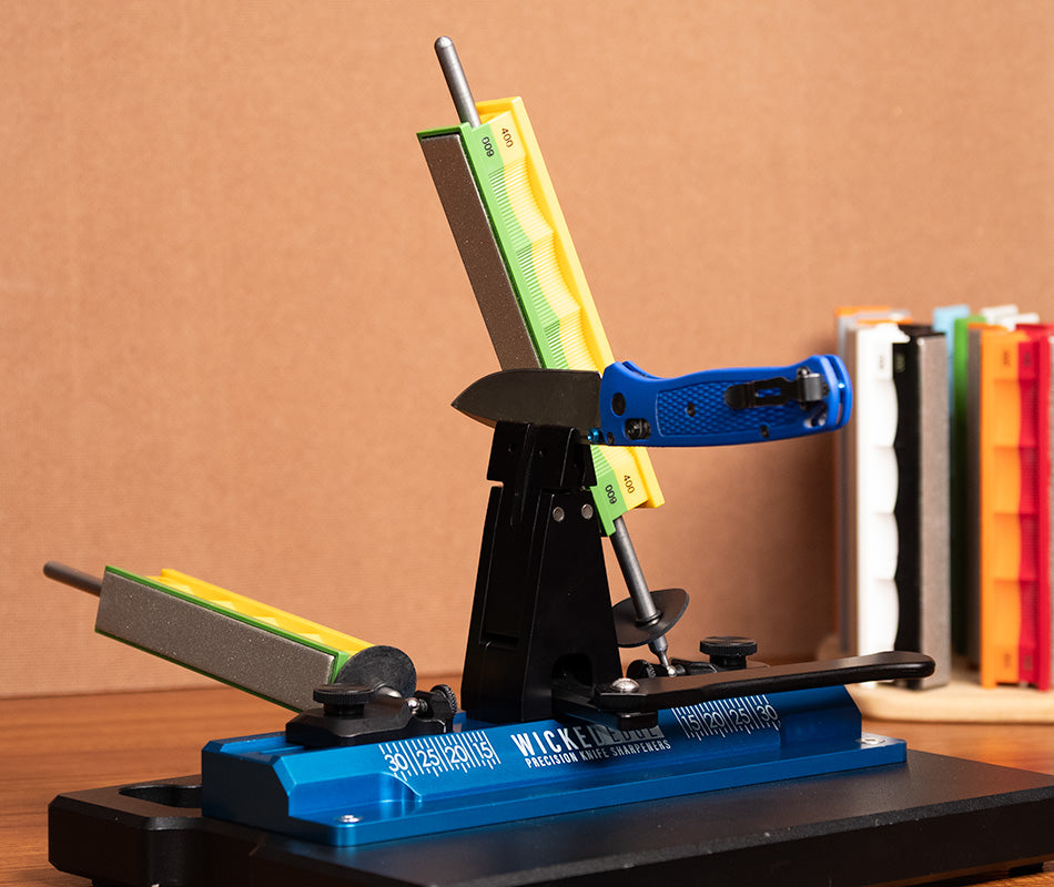 Premium 400/600 Grit Diamond Stones Pack mounted in Wicked Edge precision knife sharpener at close range from side angle.