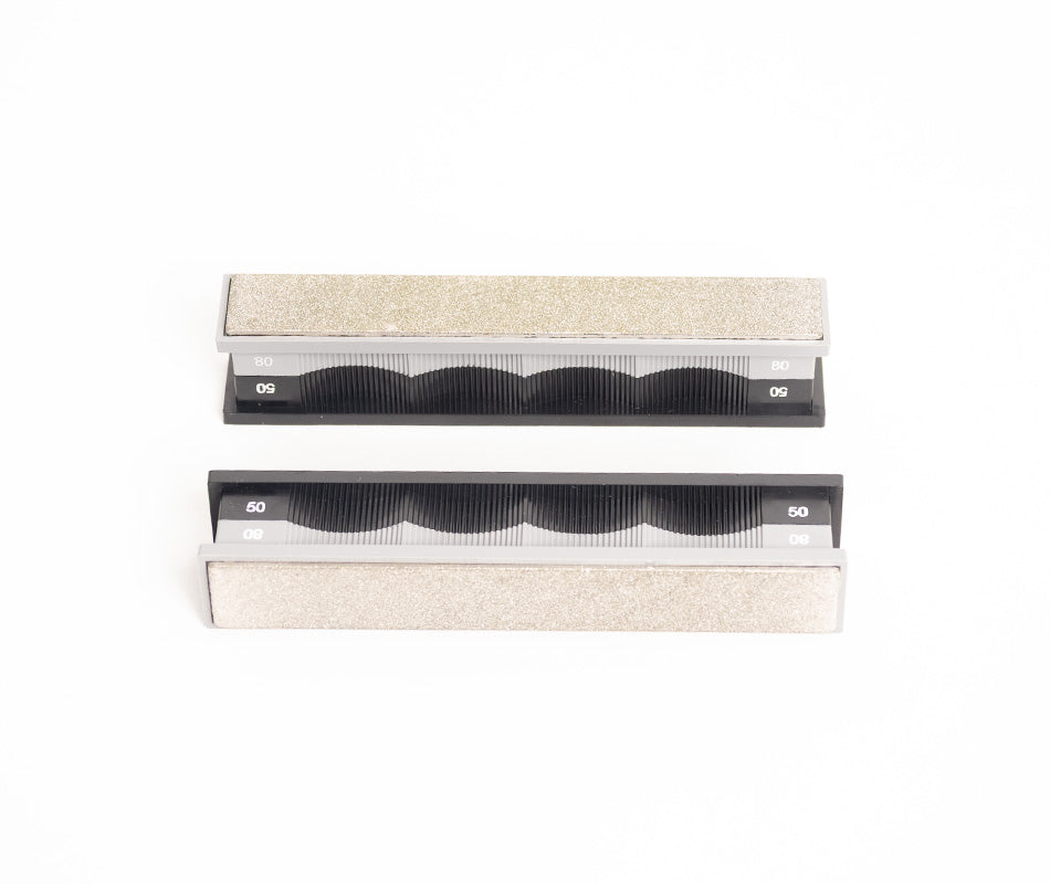 Premium 50/80 Grit Diamond Stones Pack in open case at close-up from above.