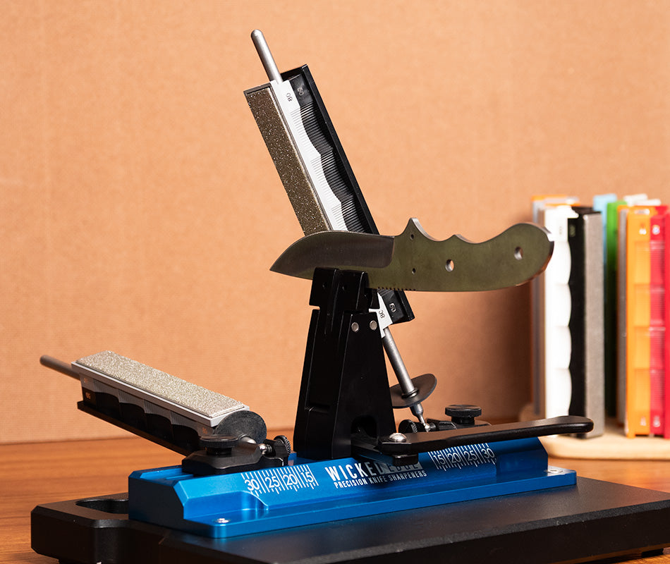 Premium 50/80 Grit Diamond Stones Pack mounted in Wicked Edge sharpener at close-up from side angle.