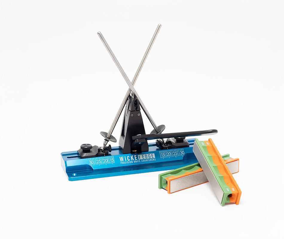 Wicked Edge Cobalt WE64 precision knife sharpener in studio setting at close-up zoom from front angle.