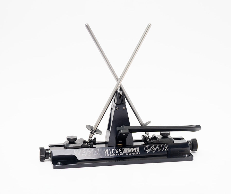 Wicked Edge Obsidian WE66 precision knife sharpener in studio setting at close-up zoom from front angle.