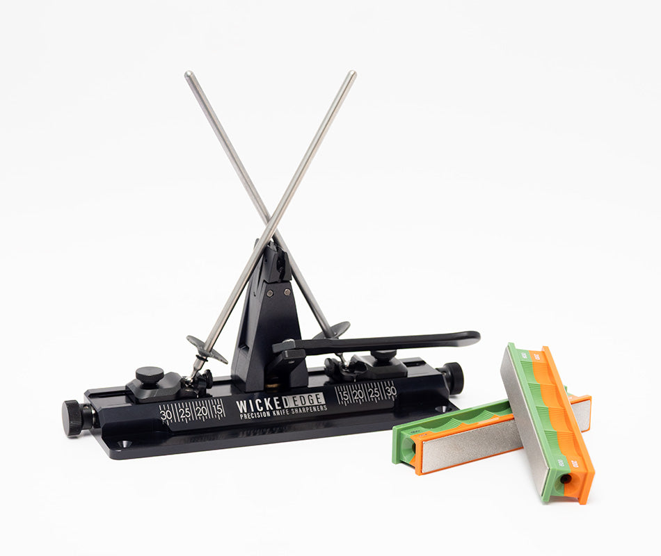 Wicked Edge Obsidian WE66 precision knife sharpener in studio setting at close-up zoom from front angle.