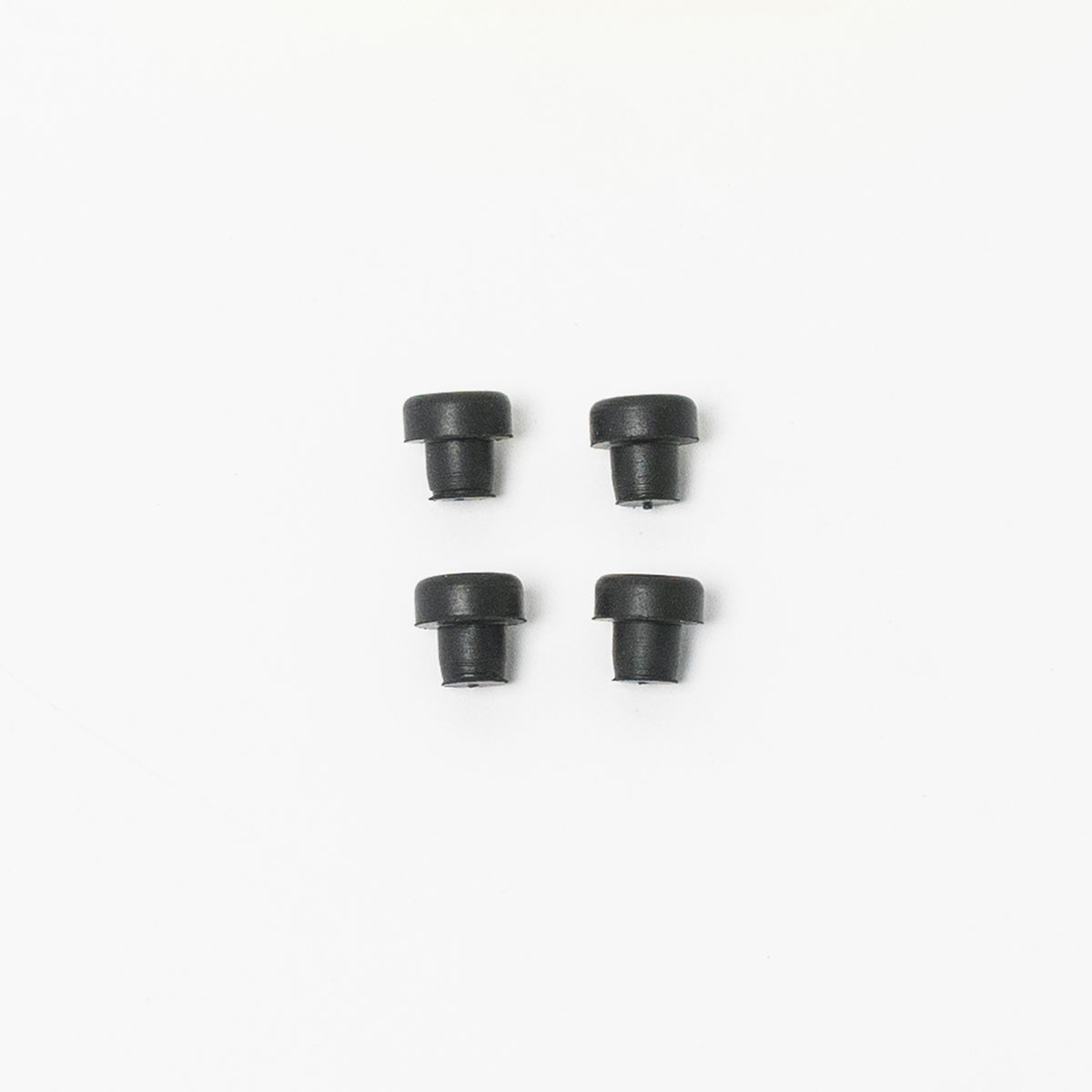 Rubber Feet Pack in close-up on white background from above.