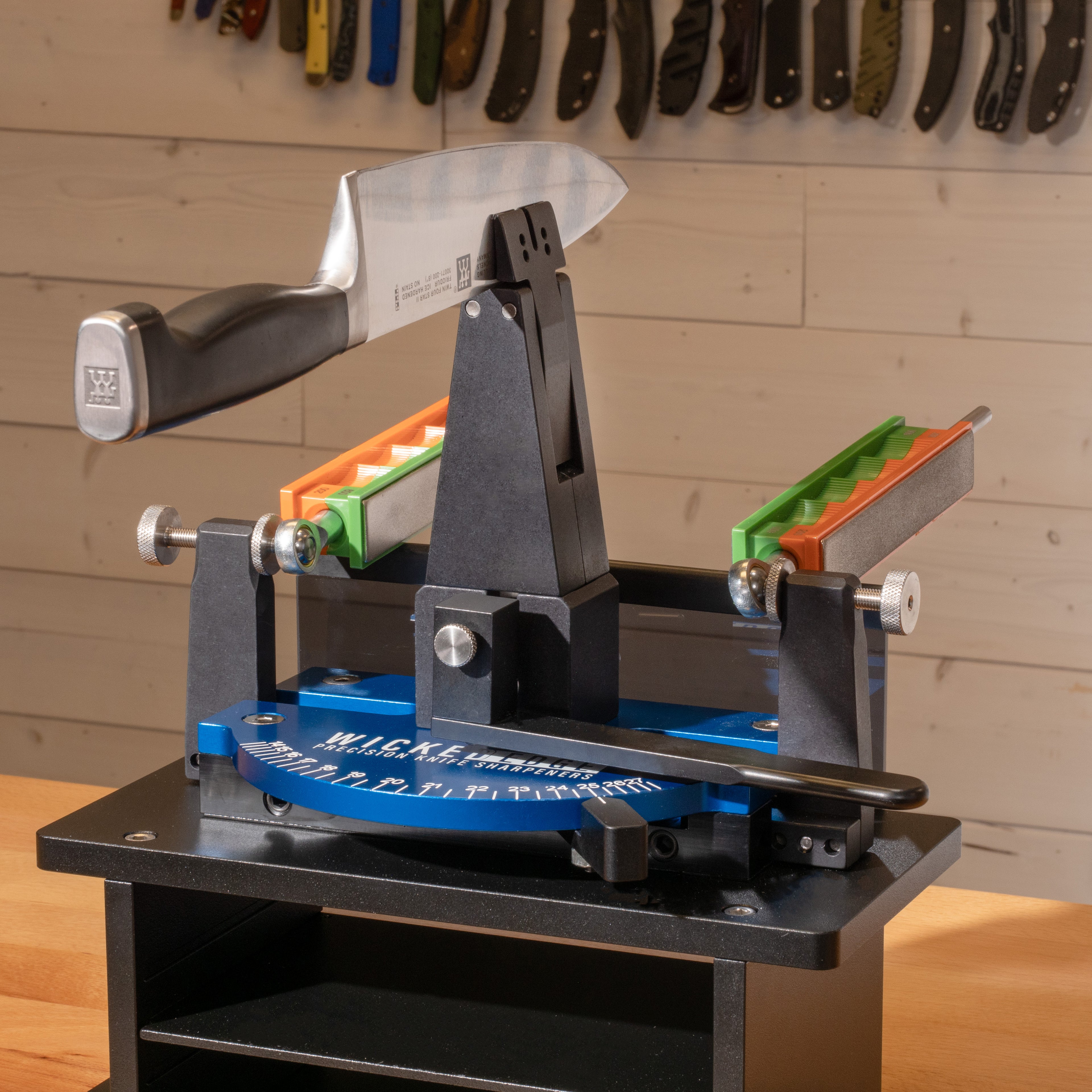 Generation 3 Pro precision knife sharpener in workshop setting at close-up zoom from front angle.