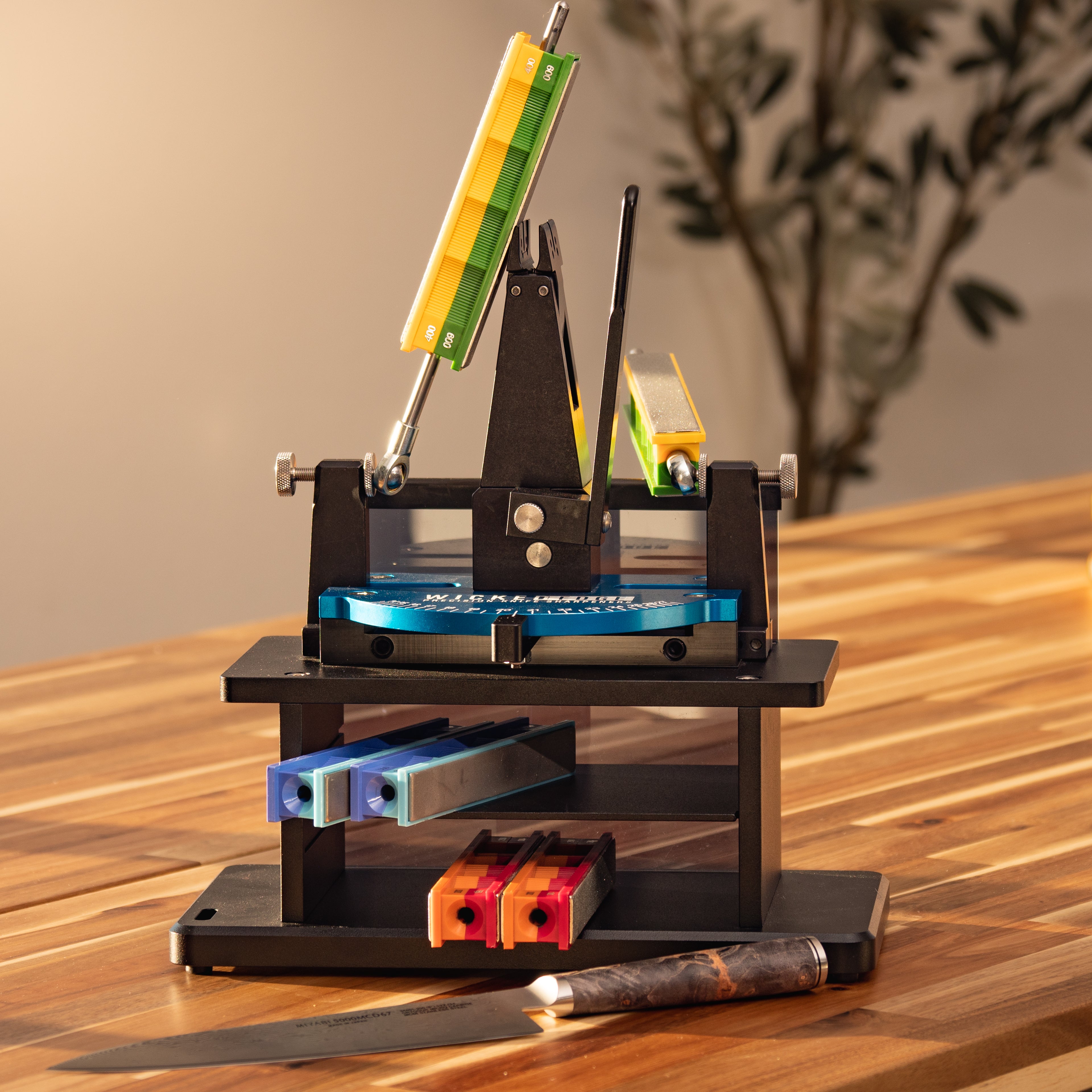 Generation 3 Pro precision knife sharpener in workshop setting at close-up view from front angle.