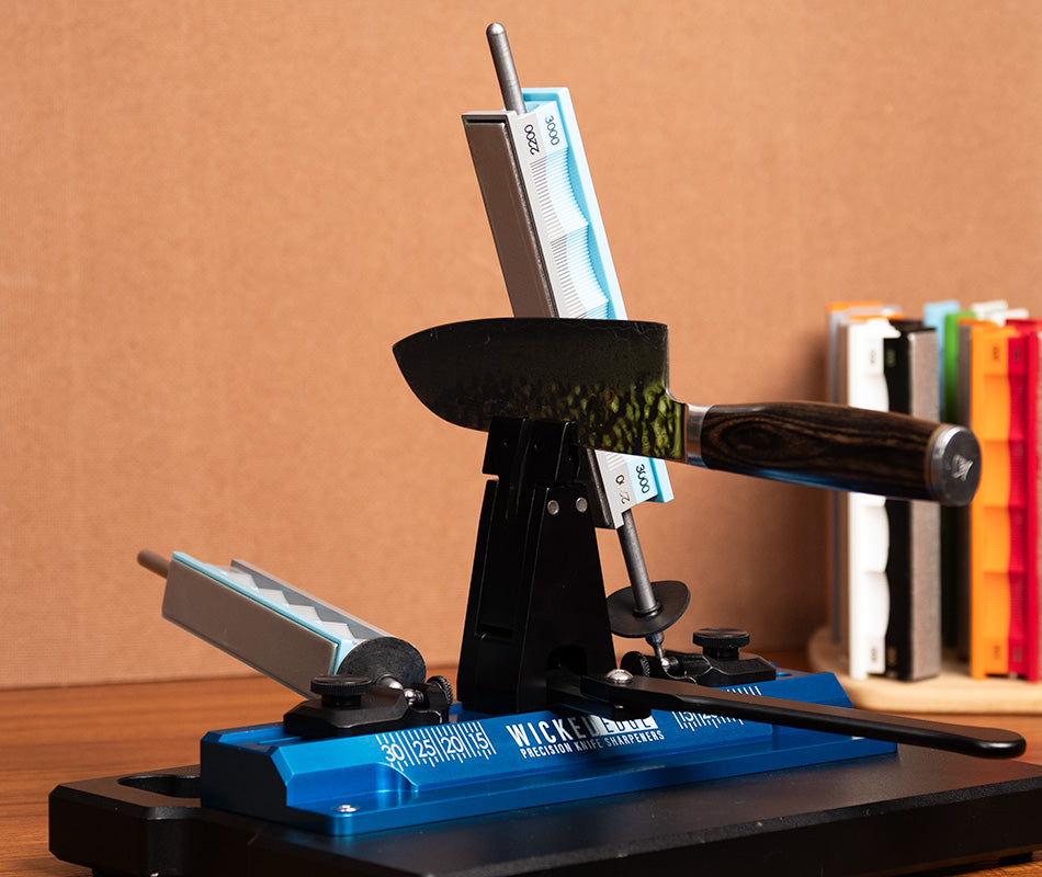 Premium 2200 / 3000 grit diamond sharpening stones mounted in Wicked Edge sharpener at close-up from front angle.