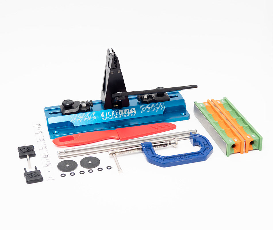 Wicked Edge Cobalt WE64 dual-sided knife sharpener in studio setting at close-up zoom from front angle.